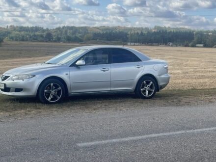 Серый Мазда 6, объемом двигателя 2 л и пробегом 350 тыс. км за 4000 $, фото 1 на Automoto.ua