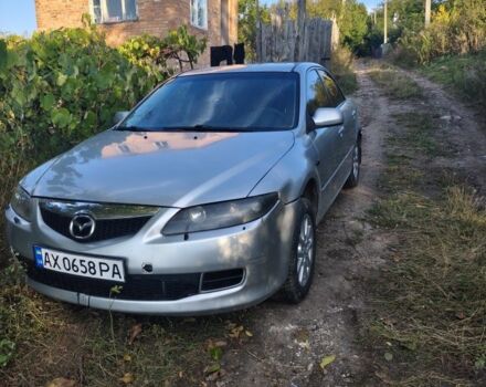 Серый Мазда 6, объемом двигателя 2 л и пробегом 400 тыс. км за 2123 $, фото 1 на Automoto.ua