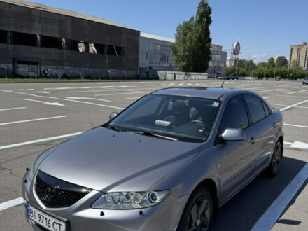 Серый Мазда 6, объемом двигателя 2 л и пробегом 320 тыс. км за 5100 $, фото 1 на Automoto.ua