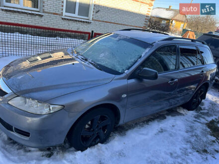 Серый Мазда 6, объемом двигателя 2 л и пробегом 319 тыс. км за 4600 $, фото 1 на Automoto.ua