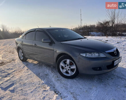 Серый Мазда 6, объемом двигателя 2 л и пробегом 249 тыс. км за 4699 $, фото 1 на Automoto.ua