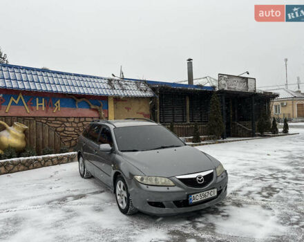 Серый Мазда 6, объемом двигателя 2 л и пробегом 315 тыс. км за 3650 $, фото 1 на Automoto.ua