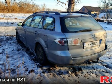 Серый Мазда 6, объемом двигателя 2 л и пробегом 357 тыс. км за 1300 $, фото 1 на Automoto.ua