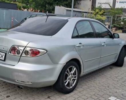 Серый Мазда 6, объемом двигателя 2 л и пробегом 373 тыс. км за 2750 $, фото 1 на Automoto.ua