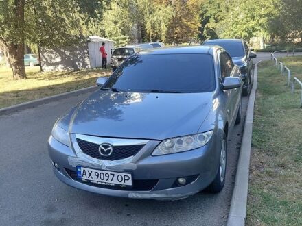 Серый Мазда 6, объемом двигателя 1.8 л и пробегом 245 тыс. км за 4650 $, фото 1 на Automoto.ua