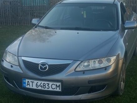 Серый Мазда 6, объемом двигателя 2 л и пробегом 313 тыс. км за 2260 $, фото 1 на Automoto.ua