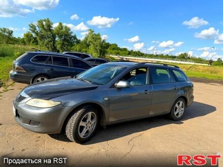 Серый Мазда 6, объемом двигателя 2 л и пробегом 214 тыс. км за 4200 $, фото 1 на Automoto.ua