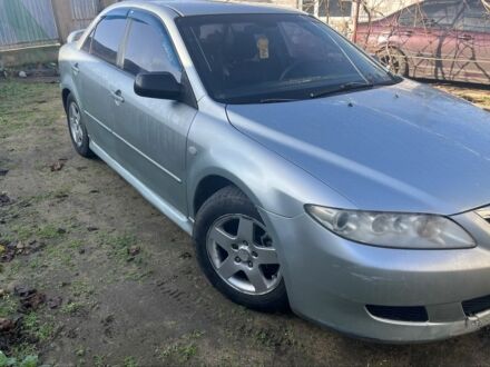 Серый Мазда 6, объемом двигателя 2 л и пробегом 350 тыс. км за 3200 $, фото 1 на Automoto.ua
