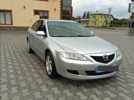 Серый Мазда 6, объемом двигателя 2 л и пробегом 250 тыс. км за 3550 $, фото 1 на Automoto.ua