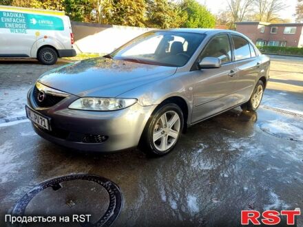 Серый Мазда 6, объемом двигателя 1.8 л и пробегом 185 тыс. км за 1150 $, фото 1 на Automoto.ua