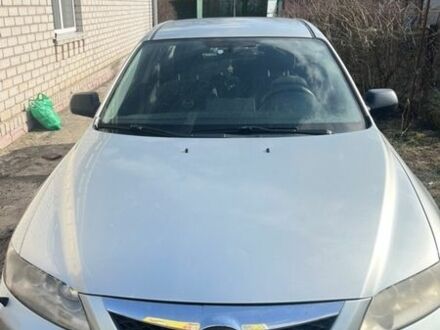 Серый Мазда 6, объемом двигателя 1.8 л и пробегом 251 тыс. км за 3800 $, фото 1 на Automoto.ua