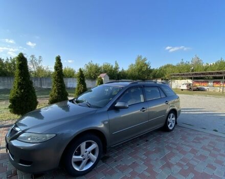 Серый Мазда 6, объемом двигателя 2 л и пробегом 250 тыс. км за 4600 $, фото 1 на Automoto.ua