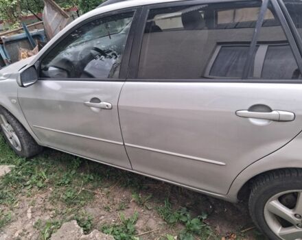 Сірий Мазда 6, об'ємом двигуна 2 л та пробігом 440 тис. км за 2698 $, фото 1 на Automoto.ua
