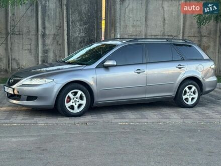 Серый Мазда 6, объемом двигателя 2 л и пробегом 297 тыс. км за 2950 $, фото 1 на Automoto.ua