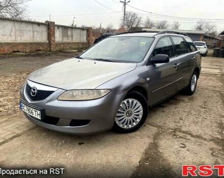 Серый Мазда 6, объемом двигателя 2 л и пробегом 270 тыс. км за 2400 $, фото 1 на Automoto.ua