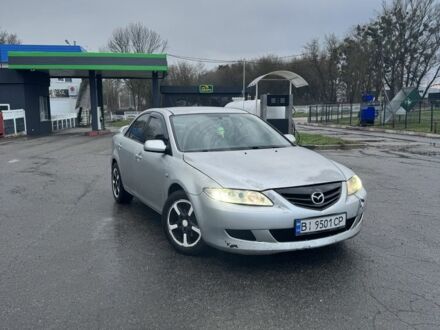 Серый Мазда 6, объемом двигателя 2.3 л и пробегом 520 тыс. км за 2934 $, фото 1 на Automoto.ua