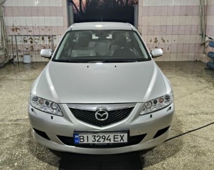 Серый Мазда 6, объемом двигателя 2 л и пробегом 256 тыс. км за 4200 $, фото 1 на Automoto.ua