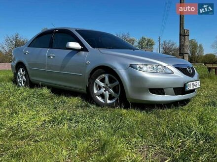 Серый Мазда 6, объемом двигателя 2 л и пробегом 250 тыс. км за 4100 $, фото 1 на Automoto.ua