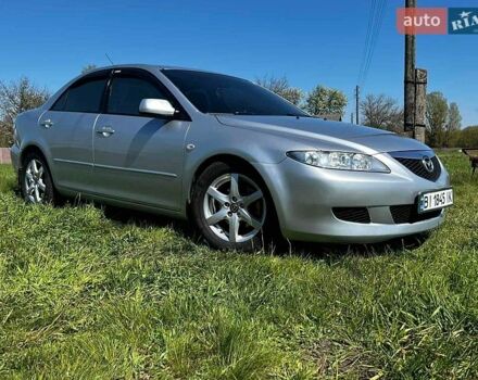 Серый Мазда 6, объемом двигателя 2 л и пробегом 250 тыс. км за 4100 $, фото 1 на Automoto.ua