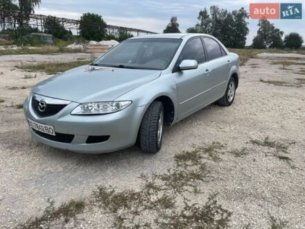 Серый Мазда 6, объемом двигателя 1.8 л и пробегом 190 тыс. км за 2500 $, фото 1 на Automoto.ua
