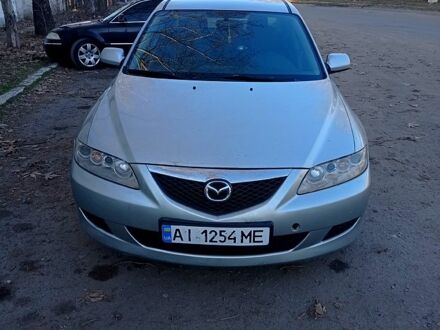 Серый Мазда 6, объемом двигателя 2 л и пробегом 352 тыс. км за 2200 $, фото 1 на Automoto.ua