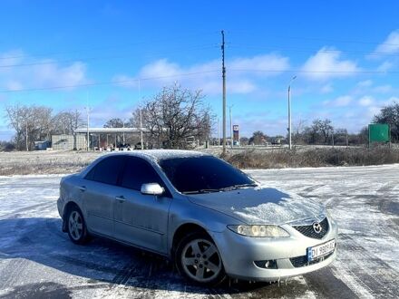 Серый Мазда 6, объемом двигателя 1.8 л и пробегом 252 тыс. км за 5000 $, фото 1 на Automoto.ua