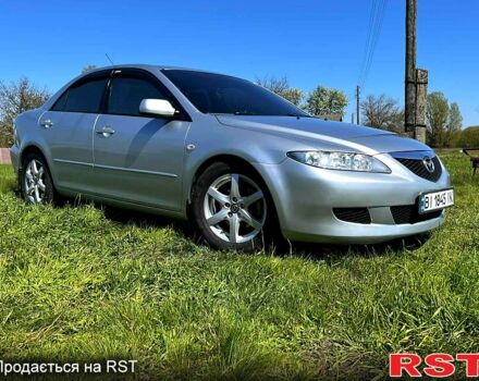Серый Мазда 6, объемом двигателя 2 л и пробегом 250 тыс. км за 4100 $, фото 1 на Automoto.ua
