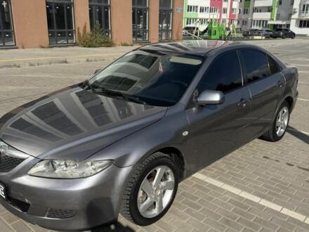 Серый Мазда 6, объемом двигателя 2 л и пробегом 300 тыс. км за 3008 $, фото 1 на Automoto.ua