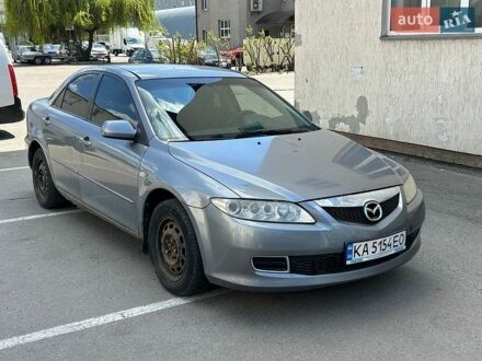 Серый Мазда 6, объемом двигателя 2 л и пробегом 421 тыс. км за 1750 $, фото 1 на Automoto.ua