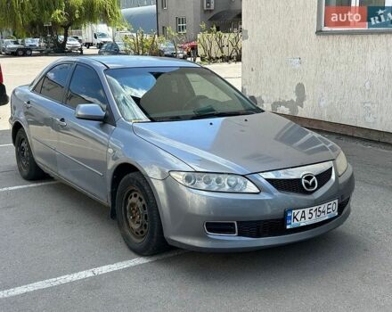 Серый Мазда 6, объемом двигателя 2 л и пробегом 421 тыс. км за 1750 $, фото 1 на Automoto.ua