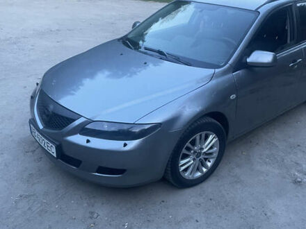 Серый Мазда 6, объемом двигателя 2 л и пробегом 245 тыс. км за 4500 $, фото 1 на Automoto.ua