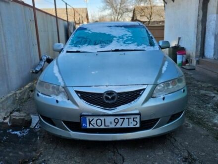 Серый Мазда 6, объемом двигателя 2 л и пробегом 250 тыс. км за 1700 $, фото 1 на Automoto.ua