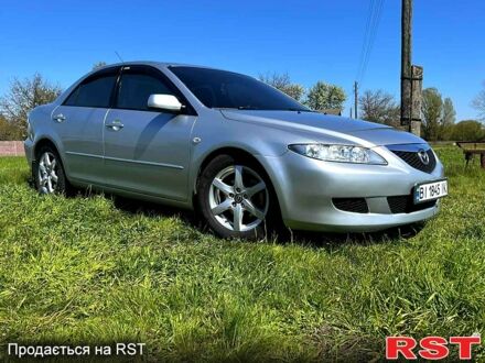 Серый Мазда 6, объемом двигателя 2 л и пробегом 250 тыс. км за 4100 $, фото 1 на Automoto.ua