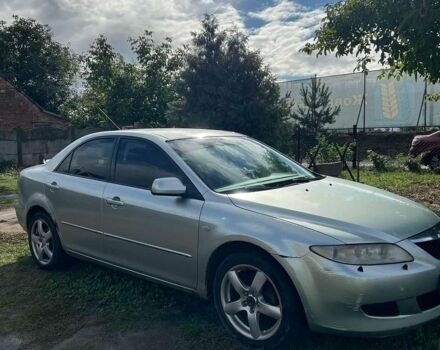 Серый Мазда 6, объемом двигателя 2 л и пробегом 450 тыс. км за 2700 $, фото 1 на Automoto.ua