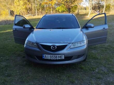 Серый Мазда 6, объемом двигателя 1.8 л и пробегом 295 тыс. км за 4500 $, фото 1 на Automoto.ua