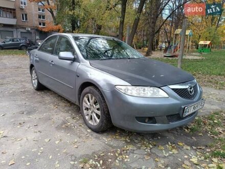 Серый Мазда 6, объемом двигателя 1.8 л и пробегом 275 тыс. км за 3200 $, фото 1 на Automoto.ua