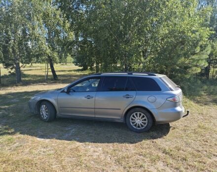 Серый Мазда 6, объемом двигателя 2 л и пробегом 365 тыс. км за 1900 $, фото 1 на Automoto.ua