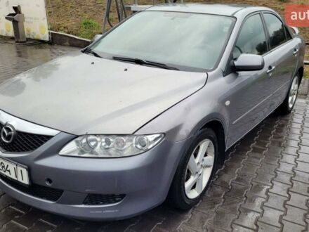 Серый Мазда 6, объемом двигателя 2 л и пробегом 234 тыс. км за 4900 $, фото 1 на Automoto.ua