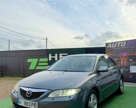 Серый Мазда 6, объемом двигателя 2 л и пробегом 272 тыс. км за 3009 $, фото 1 на Automoto.ua
