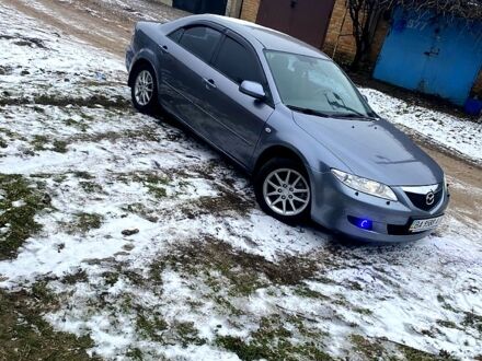 Серый Мазда 6, объемом двигателя 2 л и пробегом 230 тыс. км за 5499 $, фото 1 на Automoto.ua