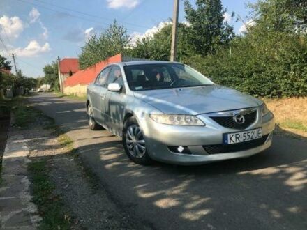 Серый Мазда 6, объемом двигателя 2 л и пробегом 317 тыс. км за 75000 $, фото 1 на Automoto.ua