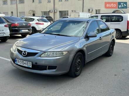 Серый Мазда 6, объемом двигателя 2 л и пробегом 421 тыс. км за 1750 $, фото 1 на Automoto.ua