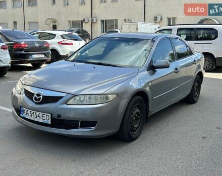 Серый Мазда 6, объемом двигателя 2 л и пробегом 421 тыс. км за 1750 $, фото 1 на Automoto.ua