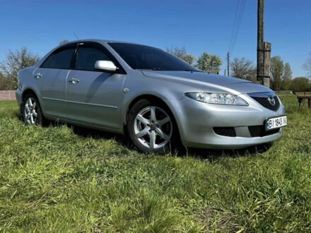 Серый Мазда 6, объемом двигателя 2 л и пробегом 250 тыс. км за 4100 $, фото 1 на Automoto.ua