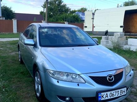 Серый Мазда 6, объемом двигателя 2 л и пробегом 412 тыс. км за 3700 $, фото 1 на Automoto.ua