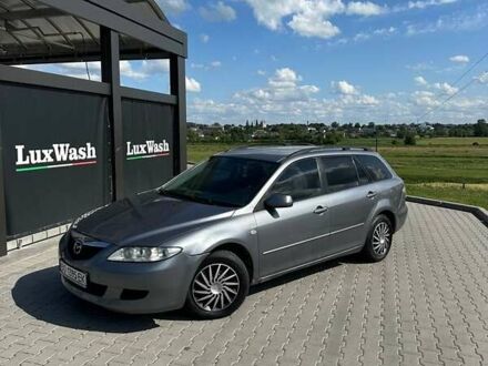 Серый Мазда 6, объемом двигателя 2 л и пробегом 280 тыс. км за 2550 $, фото 1 на Automoto.ua