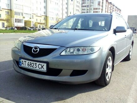 Серый Мазда 6, объемом двигателя 2 л и пробегом 224 тыс. км за 6000 $, фото 1 на Automoto.ua