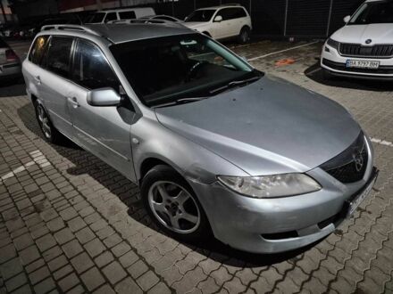 Серый Мазда 6, объемом двигателя 2 л и пробегом 280 тыс. км за 2500 $, фото 1 на Automoto.ua