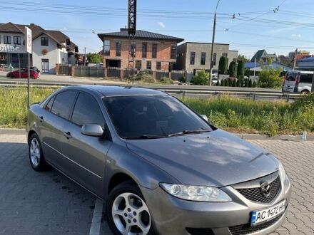 Серый Мазда 6, объемом двигателя 2 л и пробегом 255 тыс. км за 4200 $, фото 1 на Automoto.ua