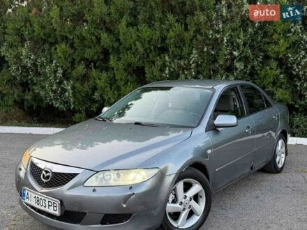 Серый Мазда 6, объемом двигателя 2 л и пробегом 338 тыс. км за 1950 $, фото 1 на Automoto.ua